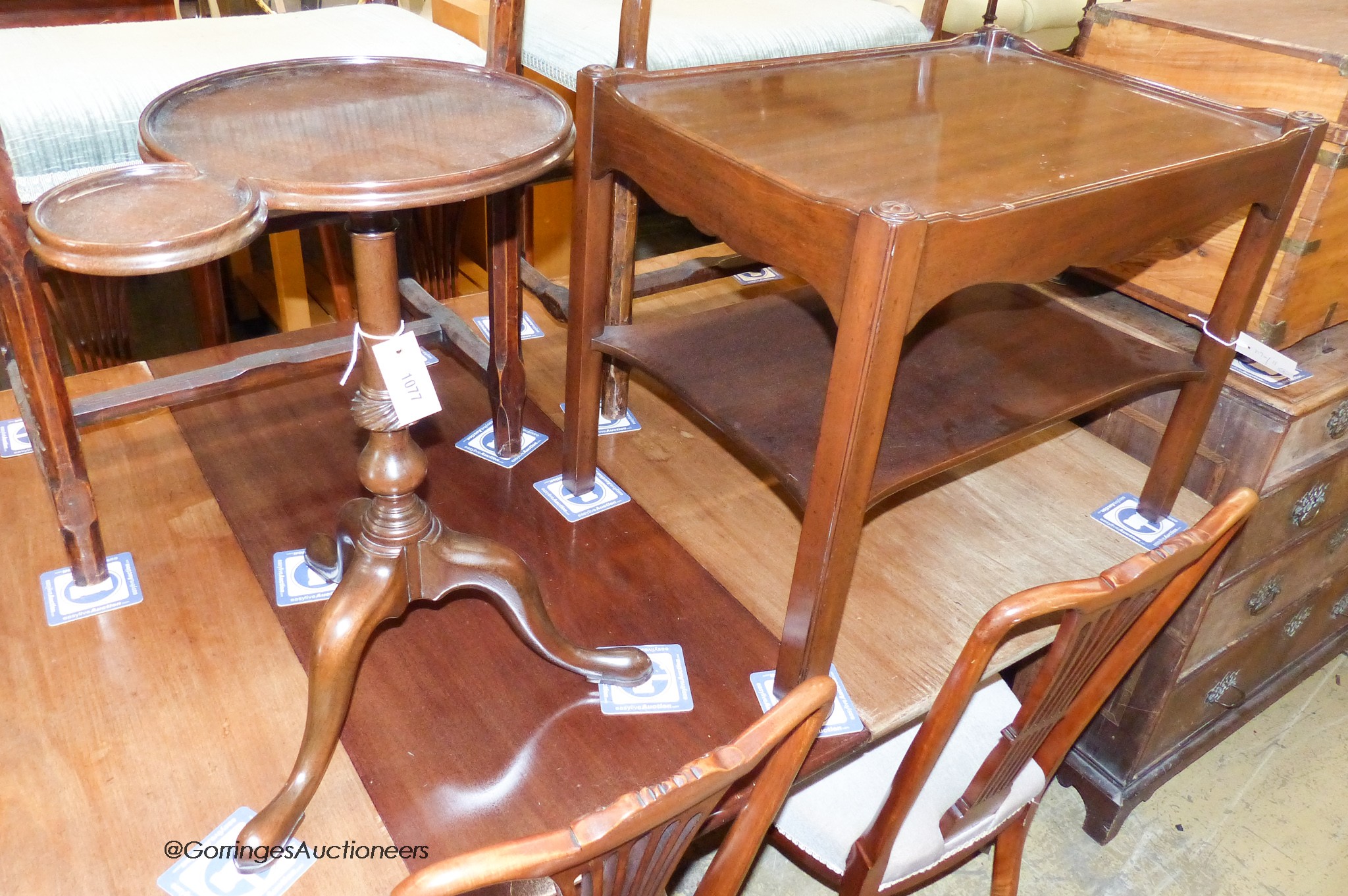 A Georgian style mahogany Kittinger furniture Georgian style tripod table. H-59cm. Together with a rectangular mahogany two tier table. H-53cm.